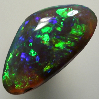 SOLID BLACK OPAL Sparkling bright greens and orange in a 3D pattern